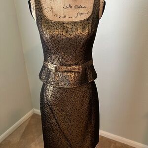 Two piece set. Top is size 4 & skirt is size 6. Light weight excellent condition